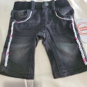Newborn Denim Jeans.  With pink and white embroidery.